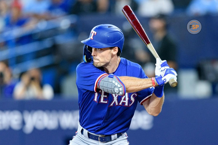 TORONTO, ON - SEPTEMBER 11: Texas Rangers Outfield Evan Carter (32) bats during the MLB baseball regular season game between the Texas Rangers  and the Toronto Blue Jays on September 11, 2023, at Rogers Centre in Toronto, ON, Canada. (Photo by Julian Avram/Icon Sportswire)