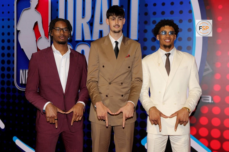 Jun 23, 2026; New York, NY, USA; Draft prospects Morez Johnson Jr. (left to right) Aday Mara and Yaxel Lendeborg pose for photos on the red carpet before the 2026 NBA draft at Barclays Center. Credit: Brad Penner-Imagn Images