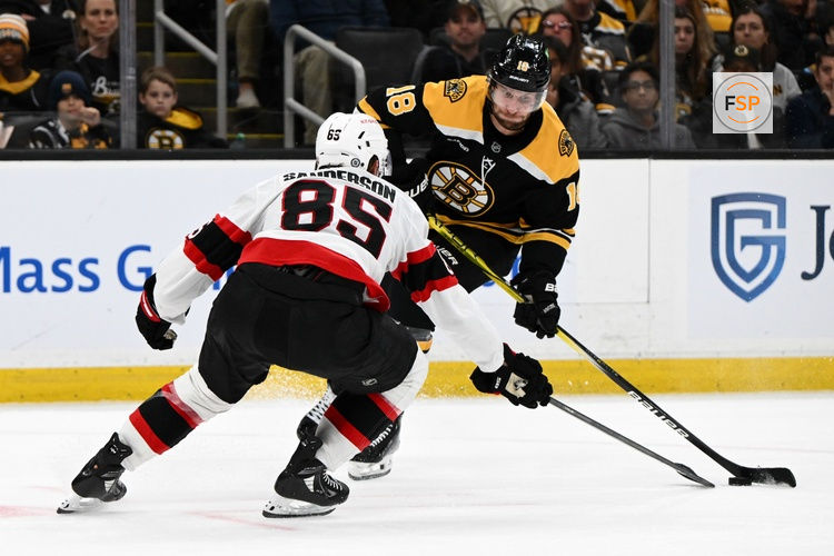 Nov 9, 2024; Boston, Massachusetts, USA; Ottawa Senators defenseman Jake Sanderson (85) defends Boston Bruins center Pavel Zacha (18) during the third period at TD Garden. Credit: Brian Fluharty-Imagn Images