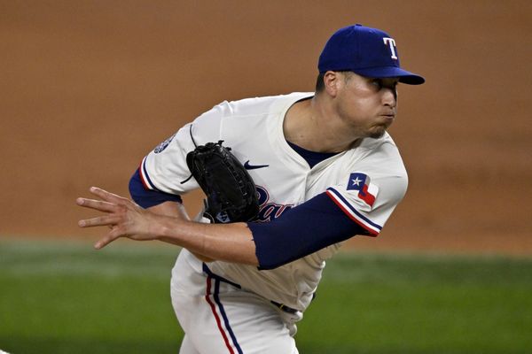 Jul 23, 2025; Arlington, Texas, USA; Texas Rangers relief pitcher Robert Garcia (62) pitches against the Athletics during the ninth inning at Globe Life Field. Mandatory Credit: Jerome Miron-Imagn Images