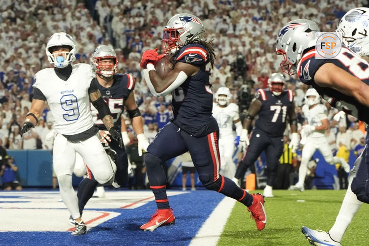 Oct 5, 2025; Orchard Park, New York, USA; New England Patriots running back Rhamondre Stevenson (38) rushes for a touchdown against the Buffalo Bills during the second half at Highmark Stadium. Credit: Gregory Fisher-Imagn Images