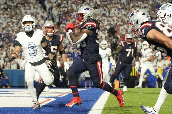 Oct 5, 2025; Orchard Park, New York, USA; New England Patriots running back Rhamondre Stevenson (38) rushes for a touchdown against the Buffalo Bills during the second half at Highmark Stadium. Mandatory Credit: Gregory Fisher-Imagn Images