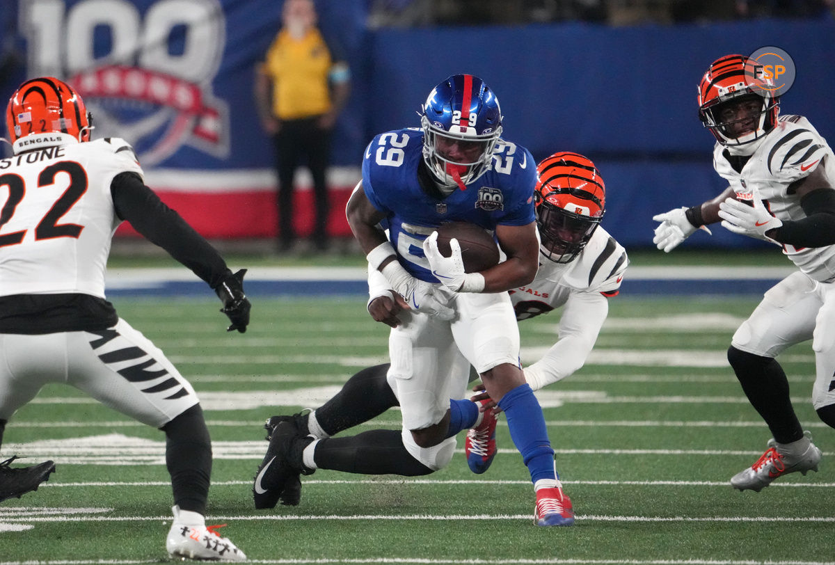 Oct 13, 2024; East Rutherford, New Jersey, USA;  New York Giants running back Tyrone Tracy Jr. (29) runs in the second half against the Cincinnati Bengals at MetLife Stadium. Credit: Robert Deutsch-Imagn Images