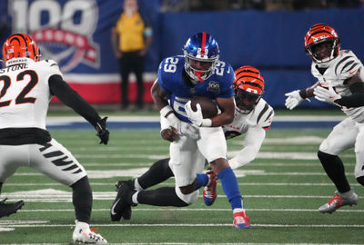 Oct 13, 2024; East Rutherford, New Jersey, USA;  New York Giants running back Tyrone Tracy Jr. (29) runs in the second half against the Cincinnati Bengals at MetLife Stadium. Mandatory Credit: Robert Deutsch-Imagn Images