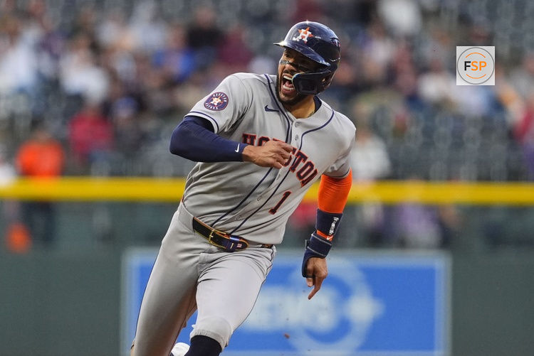 Apr 6, 2026; Denver, Colorado, USA; Houston Astros third baseman Carlos Correa (1) reacts back to the bench in the first inning against the Colorado Rockies at Coors Field. Credit: Ron Chenoy-Imagn Images