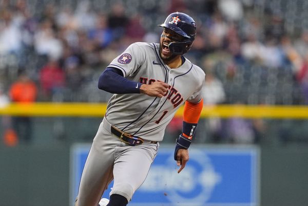 Apr 6, 2026; Denver, Colorado, USA; Houston Astros third baseman Carlos Correa (1) reacts back to the bench in the first inning against the Colorado Rockies at Coors Field. Mandatory Credit: Ron Chenoy-Imagn Images