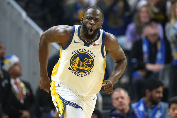 Dec 25, 2025; San Francisco, California, USA; Golden State Warriors forward Draymond Green (23) reacts after making a three point basket against the Dallas Mavericks during the second quarter at Chase Center. Mandatory Credit: Darren Yamashita-Imagn Images