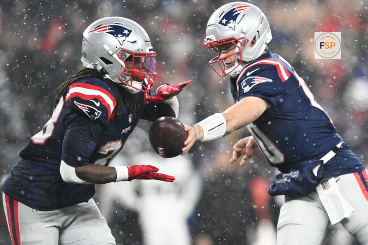 Jan 18, 2026; Foxborough, MA, USA; New England Patriots running back Rhamondre Stevenson (38) receives a hand off in the fourth quarter against the Houston Texans in an AFC Divisional Round game at Gillette Stadium. Credit: Brian Fluharty-Imagn Images
