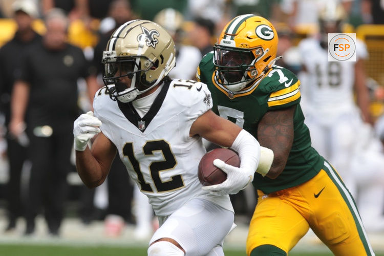 GREEN BAY, WI - SEPTEMBER 24: Green Bay Packers linebacker Quay Walker (7) chases down New Orleans Saints wide receiver Chris Olave (12) during a game between the Green Bay Packers and the New Orleans Saints on September 24, 2023 at Lambeau Field in Green Bay, WI. (Photo by Larry Radloff/Icon Sportswire)