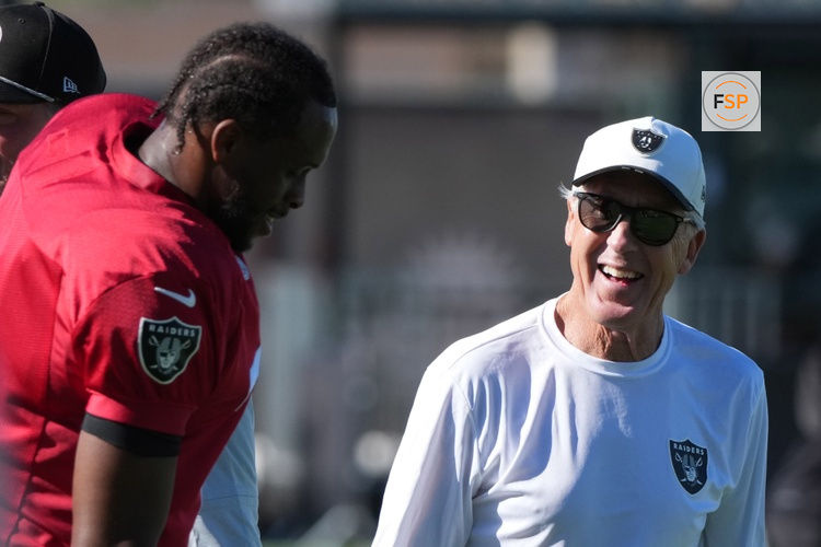Jul 24, 2025; Henderson, NV, USA; Las Vegas Raiders quarterback Geno Smith (7) with coach Pete Carroll during training camp at the Intermountain Healthcare Performance Center. Credit: Kirby Lee-Imagn Images