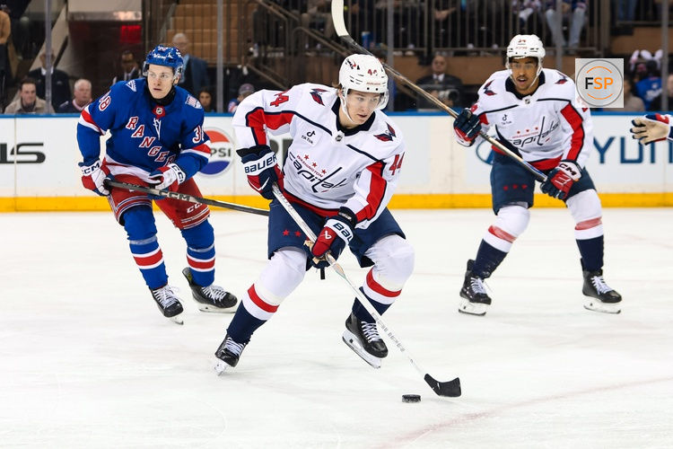Apr 5, 2026; New York, New York, USA; Washington Capitals defenseman Cole Hutson (44) skates with the puck against the New York Rangers during the second period at Madison Square Garden. Credit: Danny Wild-Imagn Images