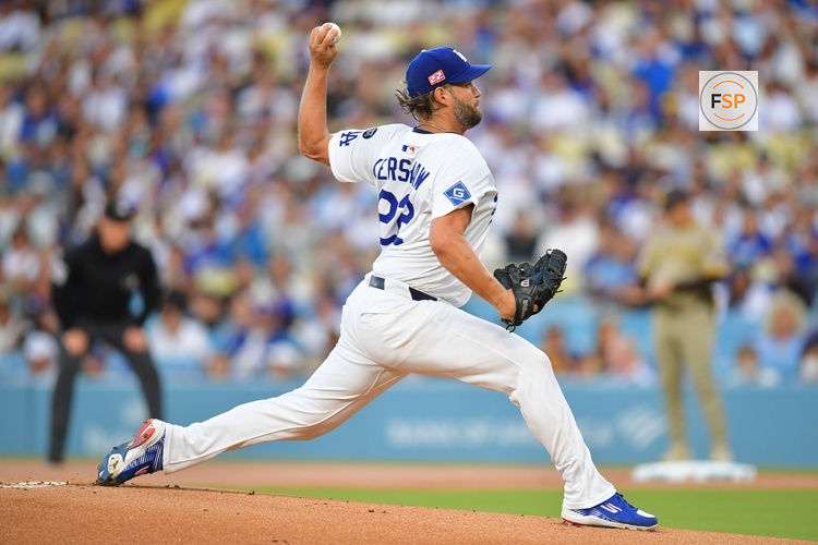 Aug 15, 2025; Los Angeles, California, USA;  Los Angeles Dodgers pitcher Clayton Kershaw (22) throws against the San Diego Padres during the first inning at Dodger Stadium. Credit: Gary A. Vasquez-Imagn Images