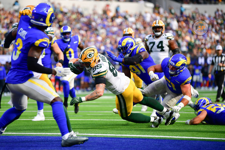 Oct 6, 2024; Inglewood, California, USA; Green Bay Packers tight end Tucker Kraft (85) is stopped short of the goal line against the Los Angeles Rams during the second half at SoFi Stadium. Credit: Gary A. Vasquez-Imagn Images