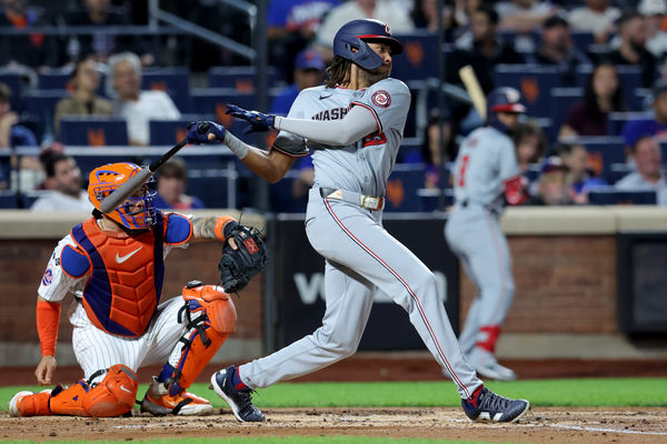 Sep 17, 2024; New York City, New York, USA; Washington Nationals left fielder James Wood (29) follows through on a run scoring fielders choice during the third inning against the New York Mets at Citi Field. Mandatory Credit: Brad Penner-Imagn Images