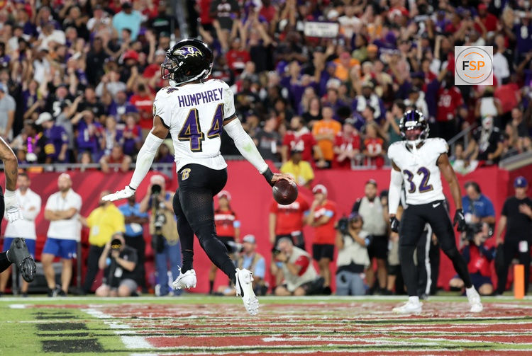 Oct 21, 2024; Tampa, Florida, USA; Baltimore Ravens cornerback Marlon Humphrey (44) celebrates after he intercepted the ball in the end zone against the Tampa Bay Buccaneers during the first half at Raymond James Stadium. Credit: Kim Klement Neitzel-Imagn Images