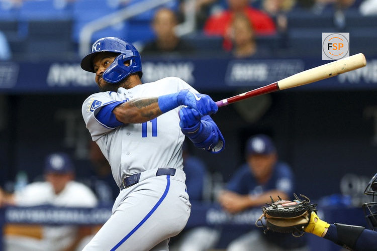 Jun 22, 2026; St. Petersburg, Florida, USA; Kansas City Royals shortstop Maikel Garcia (11) hits a double against the Tampa Bay Rays in the first inning at Tropicana Field. Credit: Nathan Ray Seebeck-Imagn Images