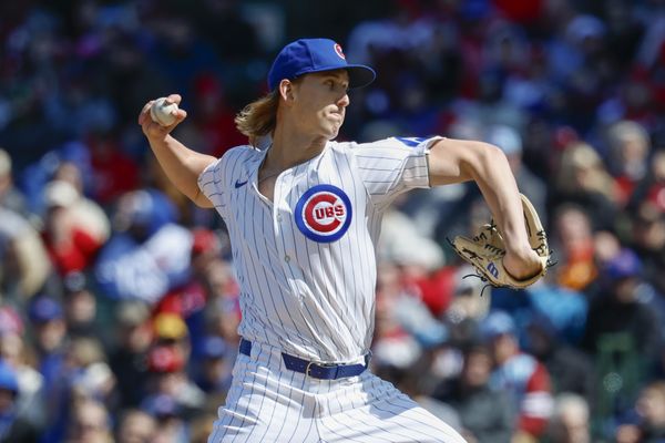 Apr 26, 2025; Chicago, Illinois, USA; Chicago Cubs starting pitcher Ben Brown (32) delivers a pitch against the Philadelphia Phillies during the first inning at Wrigley Field. Mandatory Credit: Kamil Krzaczynski-Imagn Images