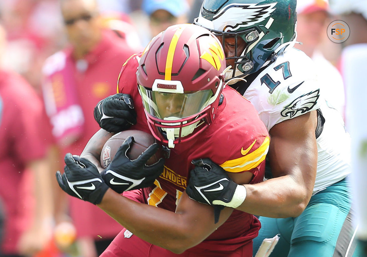 LANDOVER, MD - OCTOBER 29: Philadelphia Eagles linebacker Nakobe Dean (17) tackles Washington Commanders running back Antonio Gibson (24) during the Philadelphia Eagles game versus the Washington Commanders on October 29, 2023, at FedEx Field in Landover, MD. (Photo by Lee Coleman/Icon Sportswire)
