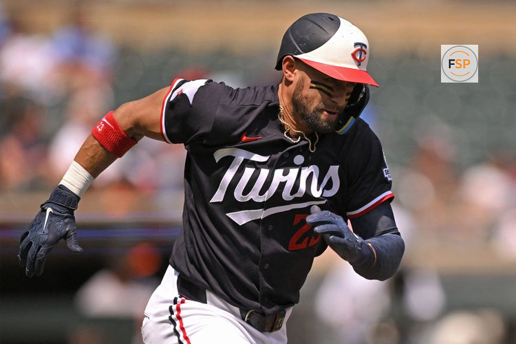 Aug 12, 2026; Minneapolis, Minnesota, USA;  Minnesota Twins infielder Royce Lewis (23) rounds first on his way to a double against the Baltimore Orioles during the third inning at Target Field. Credit: Nick Wosika-Imagn Images