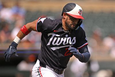 Aug 12, 2026; Minneapolis, Minnesota, USA;  Minnesota Twins infielder Royce Lewis (23) rounds first on his way to a double against the Baltimore Orioles during the third inning at Target Field. Mandatory Credit: Nick Wosika-Imagn Images