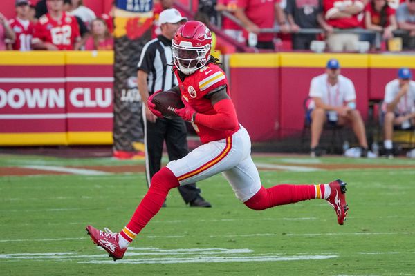 Sep 15, 2024; Kansas City, Missouri, USA; Kansas City Chiefs wide receiver Rashee Rice (4) catches a pass against the Cincinnati Bengals during the game at GEHA Field at Arrowhead Stadium. Mandatory Credit: Denny Medley-Imagn Images