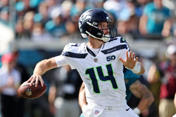 Oct 12, 2025; Jacksonville, Florida, USA; Seattle Seahawks quarterback Sam Darnold (14) drops back to make a pass during the second half against the Jacksonville Jaguars at EverBank Stadium. Mandatory Credit: Morgan Tencza-Imagn Images