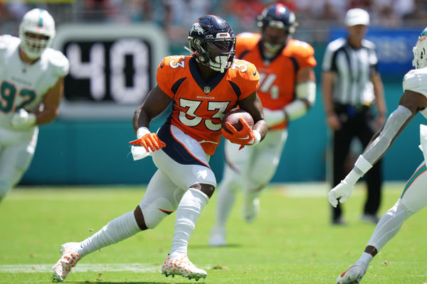 MIAMI GARDENS, FL - SEPTEMBER 24: Denver Broncos running back Javonte Williams (33) rushes after breaking multiple tackles during the game between the Denver Broncos and the Miami Dolphins on Sunday, September 24, 2023 at Hard Rock Stadium, Miami, Fla. (Photo by Peter Joneleit/Icon Sportswire)