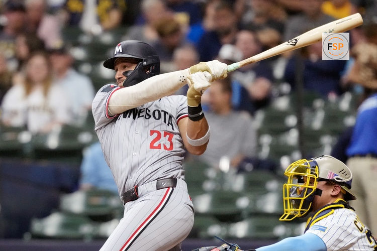 May 16, 2025; Milwaukee, Wisconsin, USA;  Minnesota Twins third baseman Royce Lewis (23) singles during the fourth inning against the Milwaukee Brewers at American Family Field. Credit: Jeff Hanisch-Imagn Images