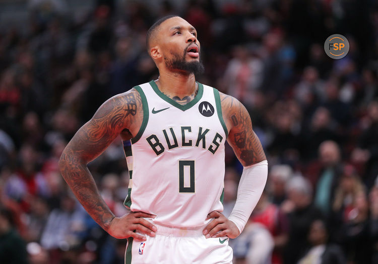 CHICAGO, IL - NOVEMBER 30: Damian Lillard #0 of the Milwaukee Bucks looks on during overtime against the Chicago Bulls at the United Center on November 30, 2023 in Chicago, Illinois. (Photo by Melissa Tamez/Icon Sportswire)