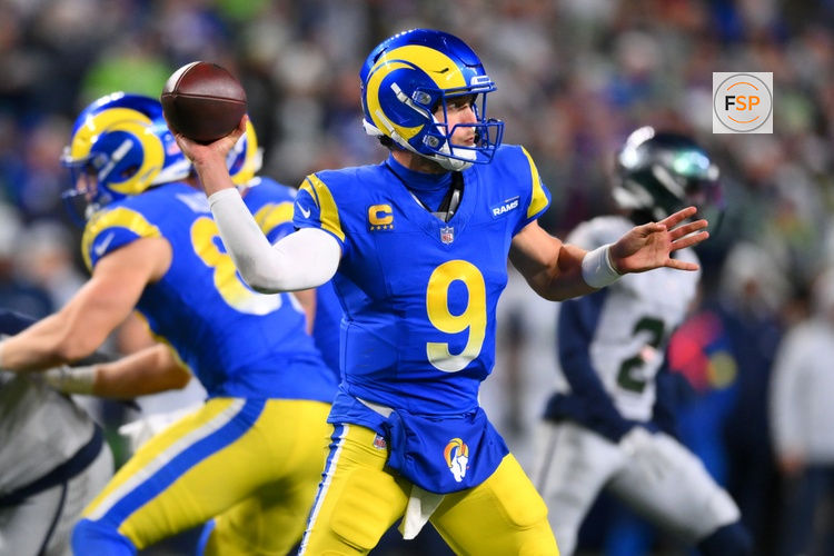 Dec 18, 2025; Seattle, Washington, USA; Los Angeles Rams quarterback Matthew Stafford (9) throws a pass against the Seattle Seahawks in overtime at Lumen Field. Credit: Steven Bisig-Imagn Images