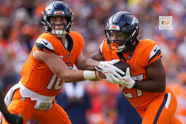 Sep 7, 2025; Denver, Colorado, USA; Denver Broncos running back J.K. Dobbins (27) receives a hand off from quarterback Bo Nix (10) during the second half at Empower Field at Mile High. Credit: Ron Chenoy-Imagn Images