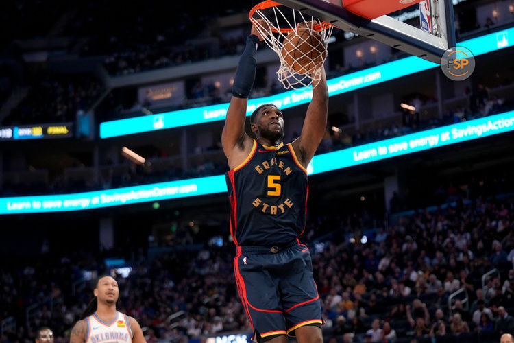 Jan 29, 2025; San Francisco, California, USA; Golden State Warriors forward Kevon Looney (5) dunks the ball against the Oklahoma City Thunder in the third quarter at the Chase Center. Credit: Cary Edmondson-Imagn Images