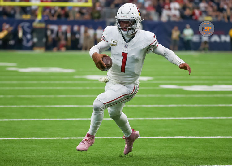 HOUSTON, TX - NOVEMBER 19:  Arizona Cardinals quarterback Kyler Murray (1) evades a tackle by Houston Texans safety Jalen Pitre (5) in the third quarter during the NFL game between the Arizona Cardinals and Houston Texans on November 19, 2023 at NRG Stadium in Houston, Texas.  (Photo by Leslie Plaza Johnson/Icon Sportswire)