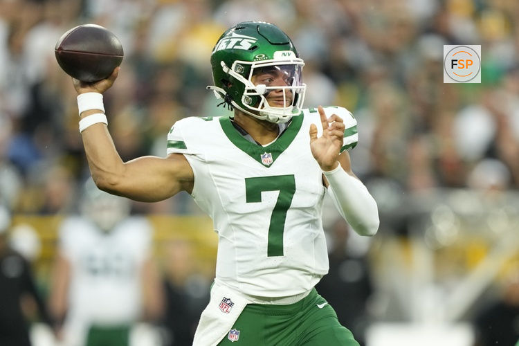 Aug 9, 2025; Green Bay, Wisconsin, USA;  New York Jets quarterback Justin Fields (7) throws a pass during the first quarter against the Green Bay Packers at Lambeau Field. Credit: Kayla Wolf-Imagn Images