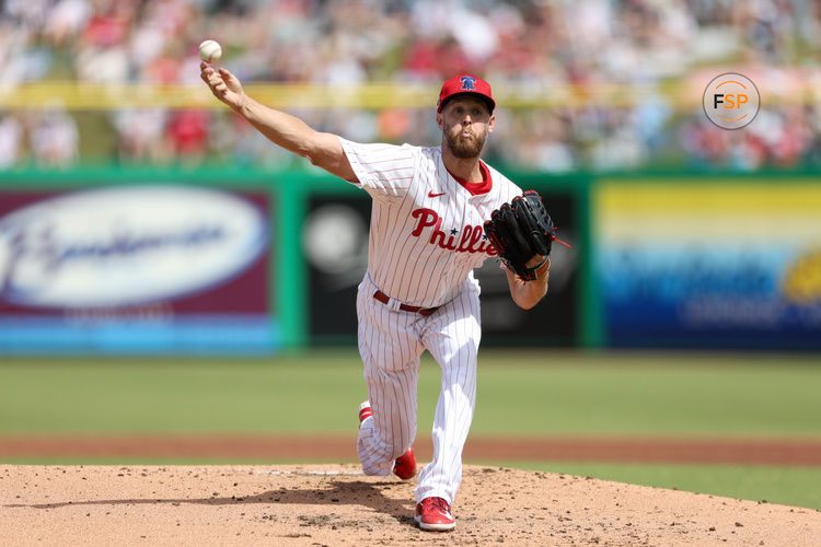 Mar 4, 2025; Clearwater, Florida, USA; Philadelphia Phillies pitcher Zack Wheeler (45) throws a pitch against the New York Yankees in the second inning during spring training at BayCare Ballpark. Credit: Nathan Ray Seebeck-Imagn Images