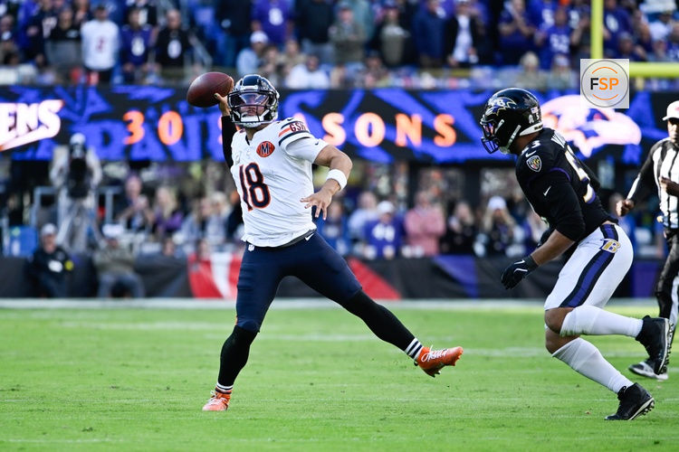 Oct 26, 2025; Baltimore, Maryland, USA; Chicago Bears quarterback Caleb Williams (18) throws a pass as Baltimore Ravens linebacker Kyle Van Noy (53) defends during the fourth quarter at M&T Bank Stadium. Credit: Tommy Gilligan-Imagn Images