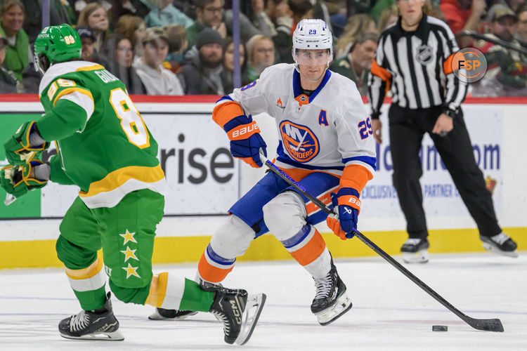 Feb 8, 2025; Saint Paul, Minnesota, USA;  New York Islanders forward Brock Nelson (29) controls the puck against the Minnesota Wild during the first period at Xcel Energy Center. Credit: Nick Wosika-Imagn Images