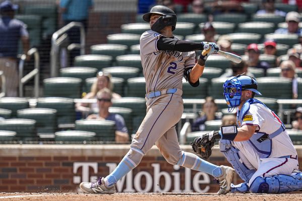 Jun 15, 2025; Cumberland, Georgia, USA; Colorado Rockies right fielder Tyler Freeman (2) singles to drive in a run against the Atlanta Braves during the seventh inning at Truist Park. Mandatory Credit: Dale Zanine-Imagn Images