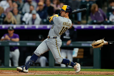 Apr 8, 2025; Denver, Colorado, USA; Milwaukee Brewers center fielder Sal Frelick (10) watches his ball on an RBI single in the third inning against the Colorado Rockies at Coors Field. Mandatory Credit: Isaiah J. Downing-Imagn Images