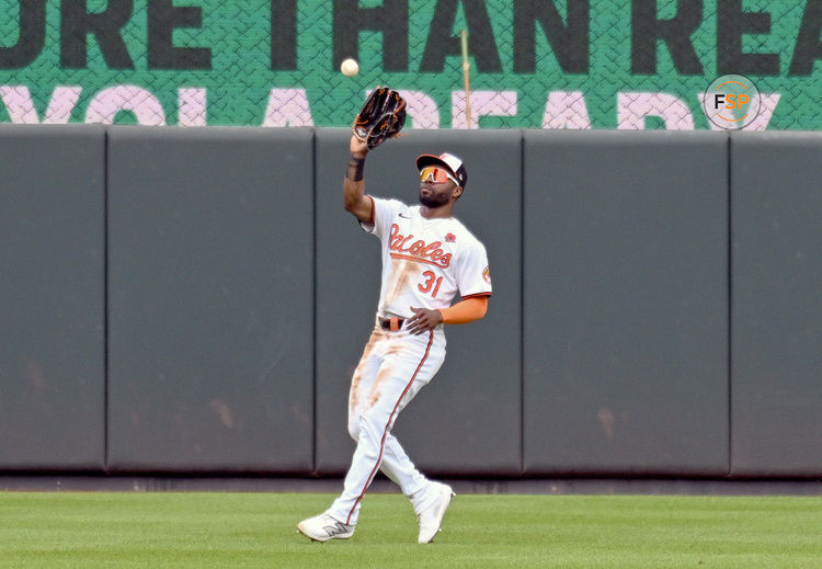 BALTIMORE, MD - MAY 27: Baltimore Orioles center fielder Cedric Mullins (31) runs down fly ball during the Boston Red Sox versus the Baltimore Orioles on May 27, 2024 at Oriole Park at Camden Yards in Baltimore, MD. (Photo by Mark Goldman/Icon Sportswire)