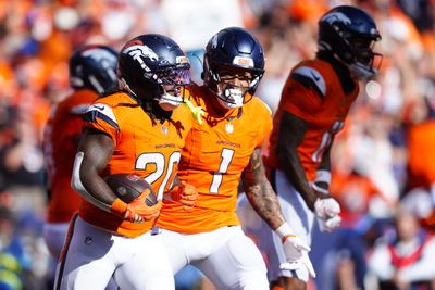 Sep 20, 2026; Denver, Colorado, USA;  Denver Broncos running back Jonah Coleman (20) celebrates with tight end Evan Engram (1) after scoring a touchdown during the fourth quarter against the Jacksonville Jaguars at Empower Field at Mile High.  Mandatory Credit: Ron Chenoy-Imagn Images