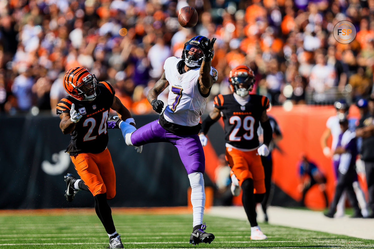 Oct 6, 2024; Cincinnati, Ohio, USA; Baltimore Ravens wide receiver Rashod Bateman (7) attempts to catch a pass against Cincinnati Bengals safety Vonn Bell (24) in the second half at Paycor Stadium. Credit: Katie Stratman-Imagn Images