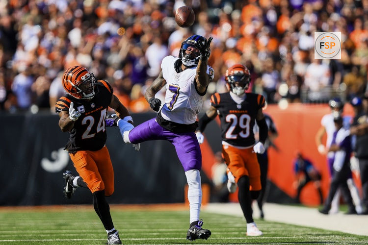 Oct 6, 2024; Cincinnati, Ohio, USA; Baltimore Ravens wide receiver Rashod Bateman (7) attempts to catch a pass against Cincinnati Bengals safety Vonn Bell (24) in the second half at Paycor Stadium. Credit: Katie Stratman-Imagn Images