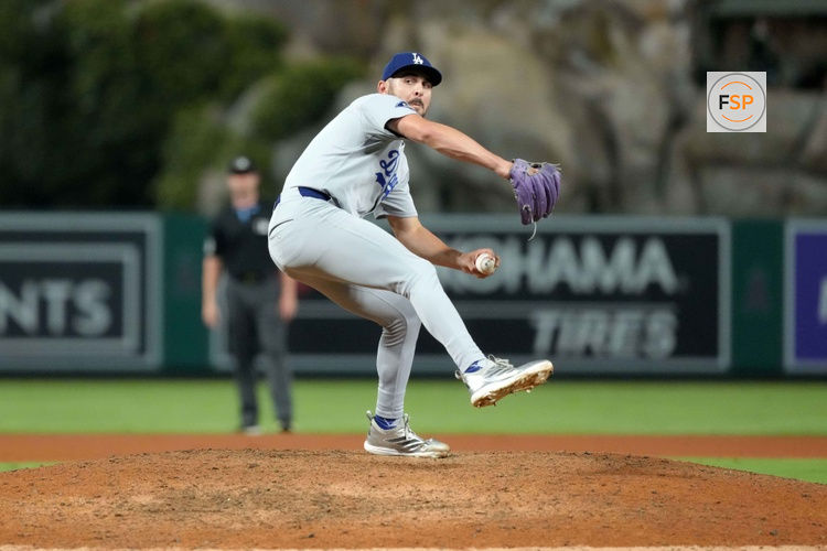 Aug 12, 2025; Anaheim, California, USA; Los Angeles Dodgers relief pitcher Alex Vesia (51) throws against the Los Angeles Angels at Angel Stadium. Credit: Kirby Lee-Imagn Images