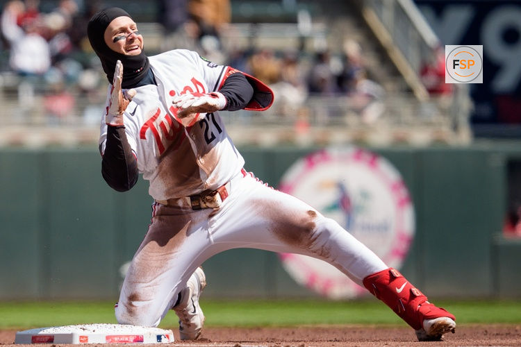 Apr 18, 2026; Minneapolis, Minnesota, USA; Minnesota Twins catcher Ryan Jeffers (27) celebrates a triple off a pitch from Cincinnati Reds pitcher Andrew Abbott (41) in the first inning at Target Field. Credit: Matt Blewett-Imagn Images