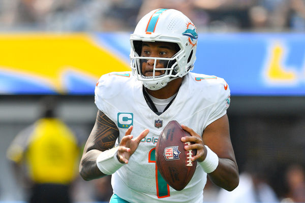 INGLEWOOD, CA - SEPTEMBER 10: Miami Dolphins quarterback Tua Tagovailoa (1) rolls out during the NFL regular season game between the Miami Dolphins and the Los Angeles Chargers on September 10, 2023, at SoFi Stadium in Inglewood, CA. (Photo by Brian Rothmuller/Icon Sportswire)