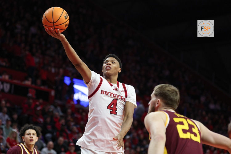 Mar 9, 2025; Piscataway, New Jersey, USA; Rutgers Scarlet Knights guard Ace Bailey (4) goes to the basket during the second half against Minnesota Golden Gophers forward Parker Fox (23) at Jersey Mike's Arena. Credit: Vincent Carchietta-Imagn Images