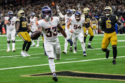 Oct 17, 2024; New Orleans, Louisiana, USA; Denver Broncos running back Javonte Williams (33) scores a touchdown against the New Orleans Saints during the second quarter at Caesars Superdome. Mandatory Credit: Matthew Hinton-Imagn Images