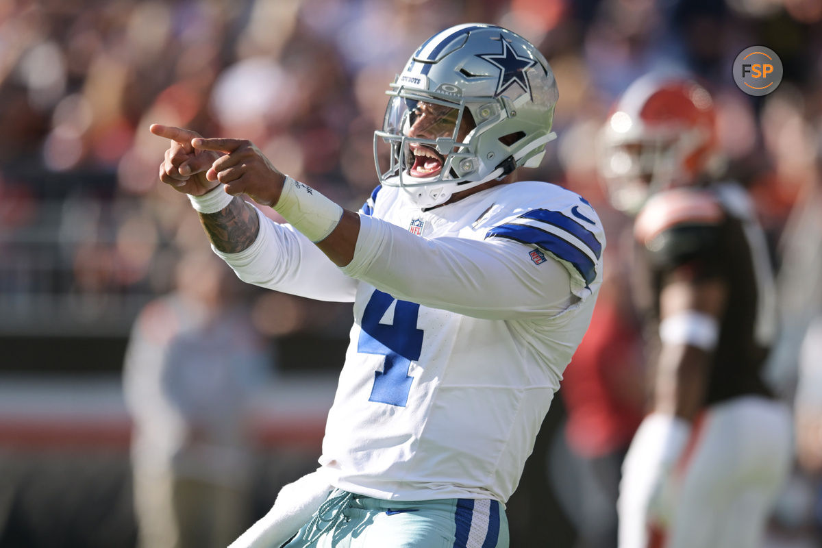 Sep 8, 2024; Cleveland, Ohio, USA; Dallas Cowboys quarterback Dak Prescott (4) celebrates after a touchdown during the first half against the Cleveland Browns at Huntington Bank Field. Credit: Ken Blaze-Imagn Images