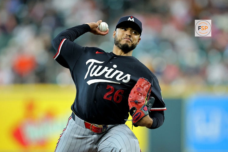 Jul 1, 2026; Houston, Texas, USA; Minnesota Twins pitcher Taj Bradley (26) delivers a pitch against the Houston Astros during the first inning at Daikin Park. Credit: Erik Williams-Imagn Images
